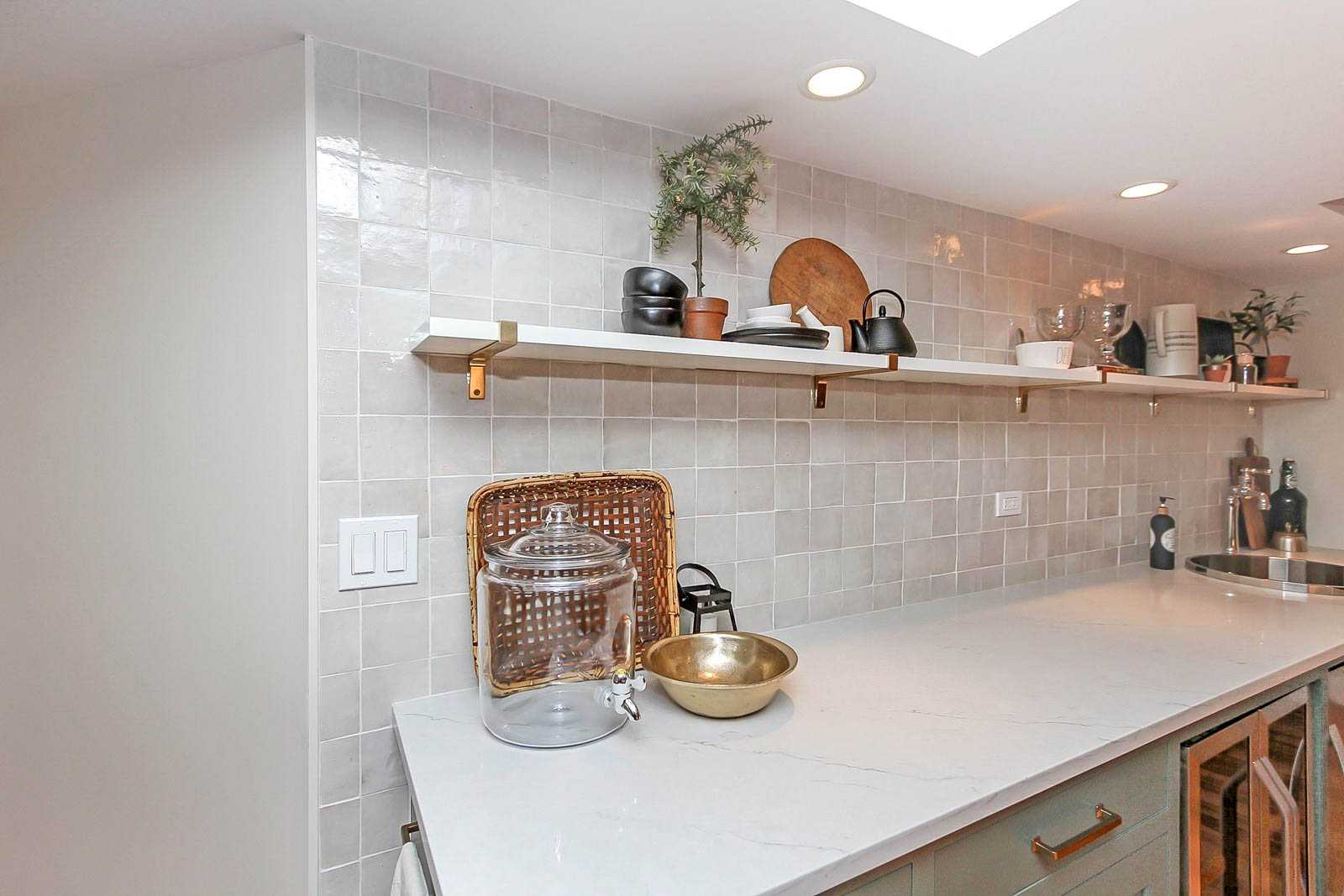 Custom Wall Shelving and Tile Backsplash on Basement Wet Bar