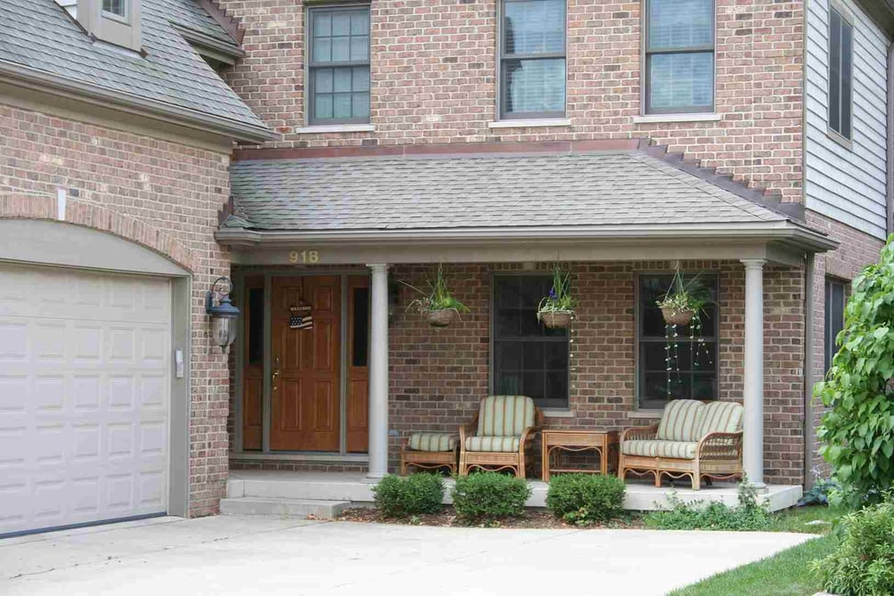 Georgian Brick by Benjamin Moore in Custom Home Exterior With Front Porch