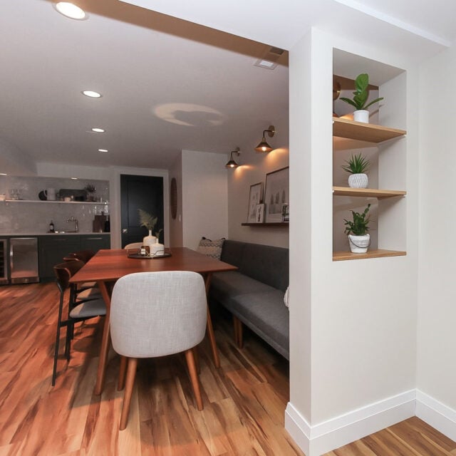 Custom Shelving Storage Built Into Wall With Plant Decor 