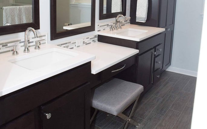 His and hers vanity with lower level seating area built in