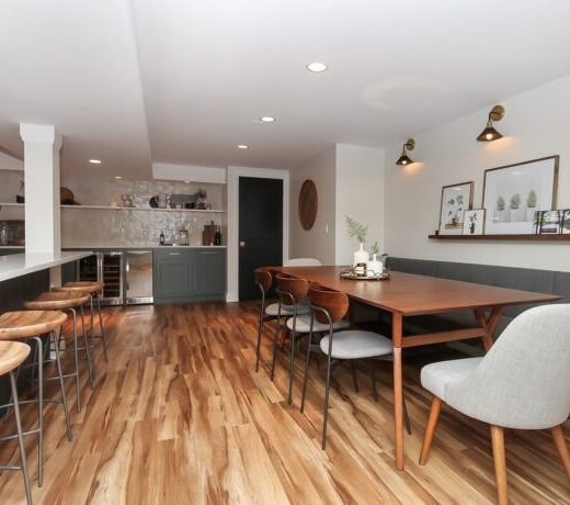 basement dining area remodel with bar and stool and table with booth in chicago remodel