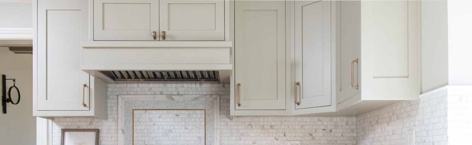 Revere Pewter kitchen cabinet color of the year paired with hale navy