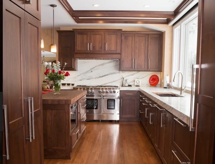 Kitchen Renovation With Recessed Panel Cabinet Doors and White Backsplash