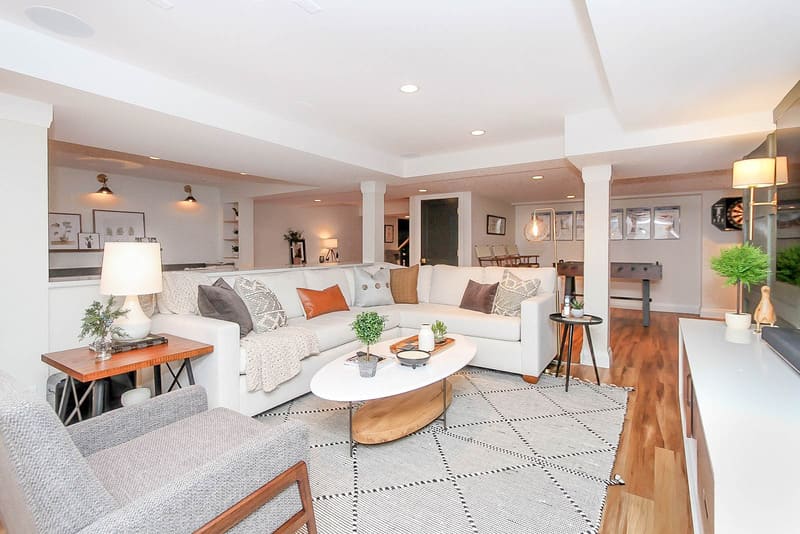 Remodeled Basement Living Room Area With Tray Ceiling by Patrick A. Finn