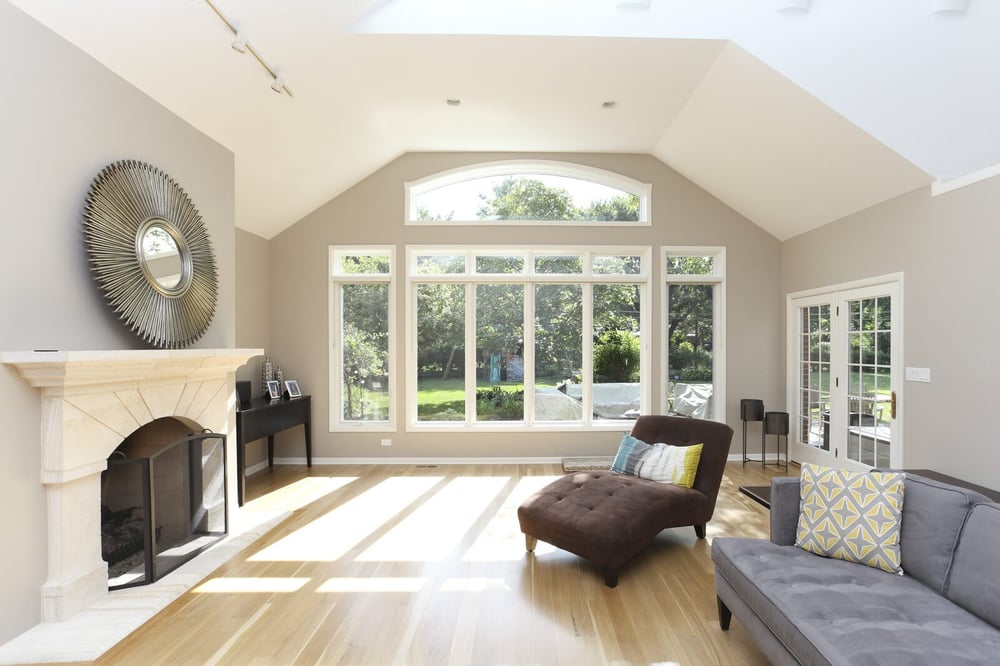 bright and airy sunroom with couches in arlington heights