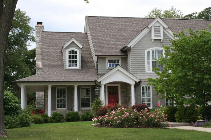 custom home exterior with flowers in arlington heights