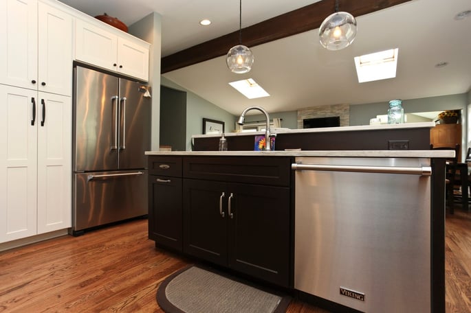 Kitchen prep sink on island with stainless steel dishwasher