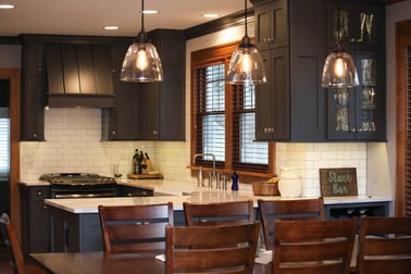Kitchen remodel with shaker cabinets and hanging light fixtures