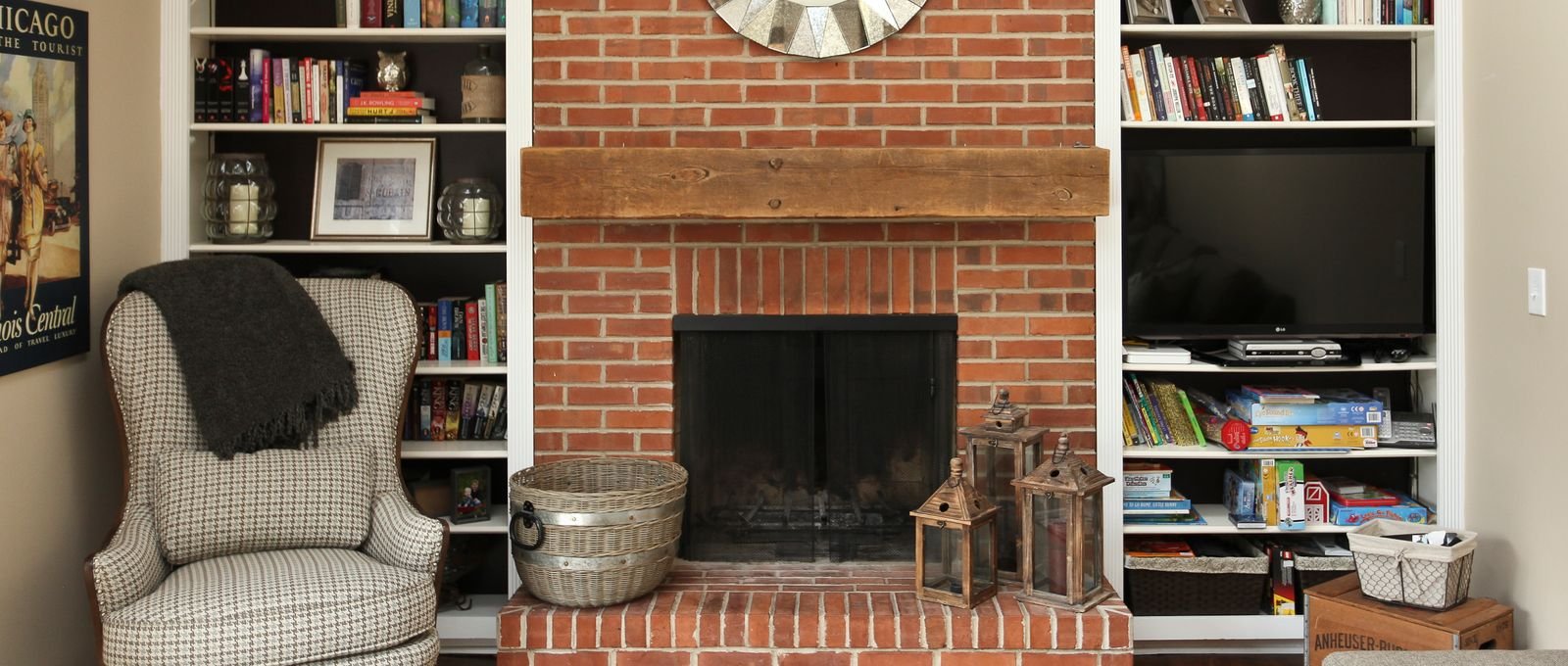 rustic fireplace with brick and custom wood beam in barrington (1)