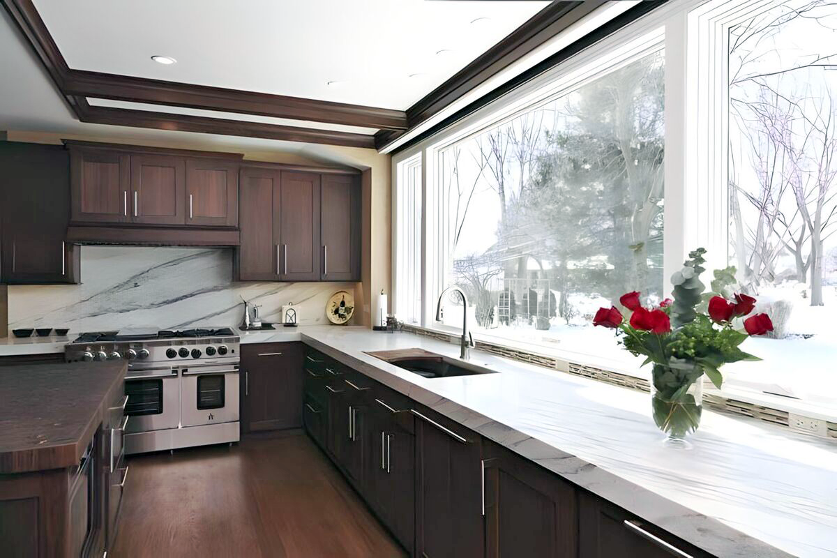 view-of-kitchen-remodel-with-walnut-cabinetry-and-large-windows